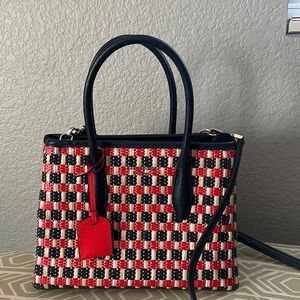 Small gently used navy blue and red Kate Spade bag.